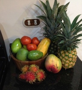 Tomatoes, avocados, papaya, rambutan, mango, pineapples